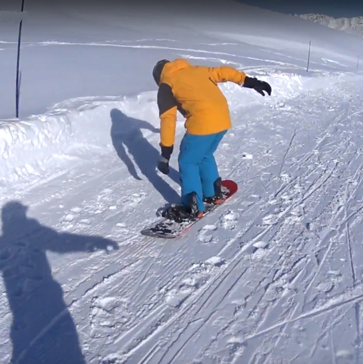 Unstrapped Snowboard Falls Off Cliff