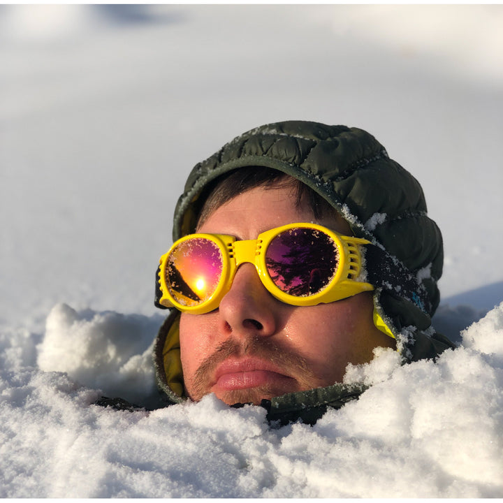 Jerry of the Day Send-O-Vision 2.0 Speed Goggles in yellow, man buried in snow. Funny ski and snowboard gifts, shirts, and apparel.