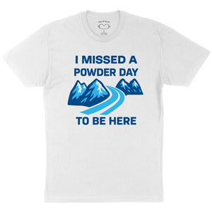 White t-shirt with blue graphic and text 'I MISSED A POWDER DAY TO BE HERE'