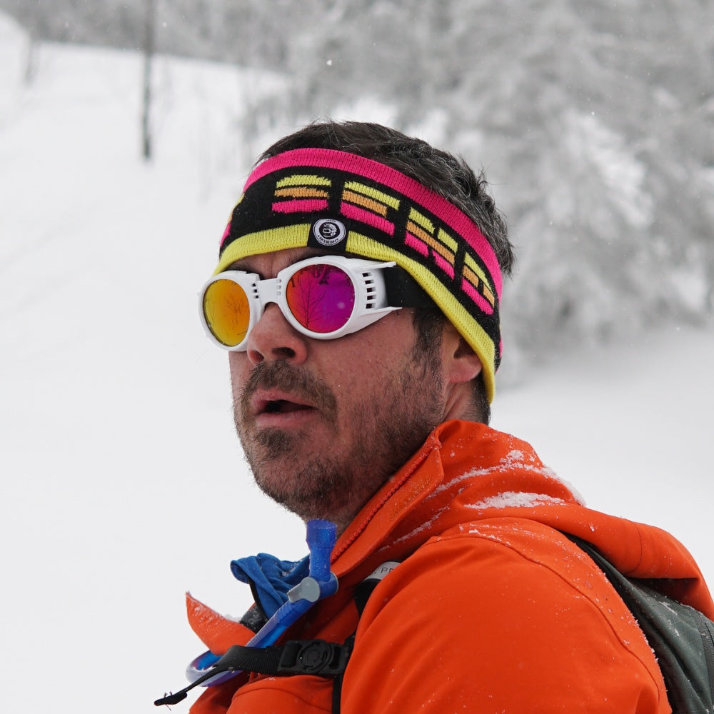 Jerry of the Day Send-O-Vision 2.0 Speed Goggles in white, man wearing on snowy day. Funny ski and snowboard gifts, shirts, and apparel.
