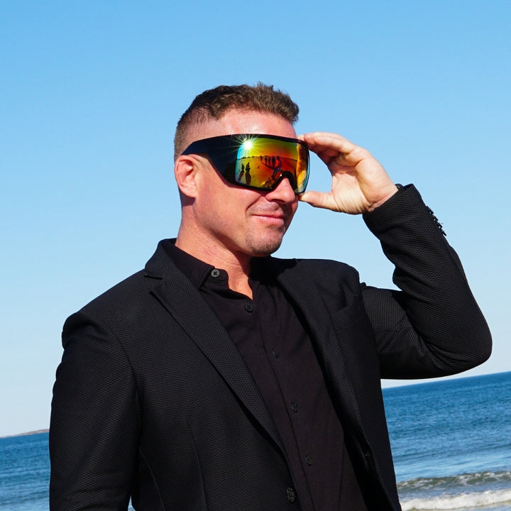 Jerry of the Day Send-O-Vision Magnum glasses in black, man wearing at lake event. Funny ski apparel and gifts.
