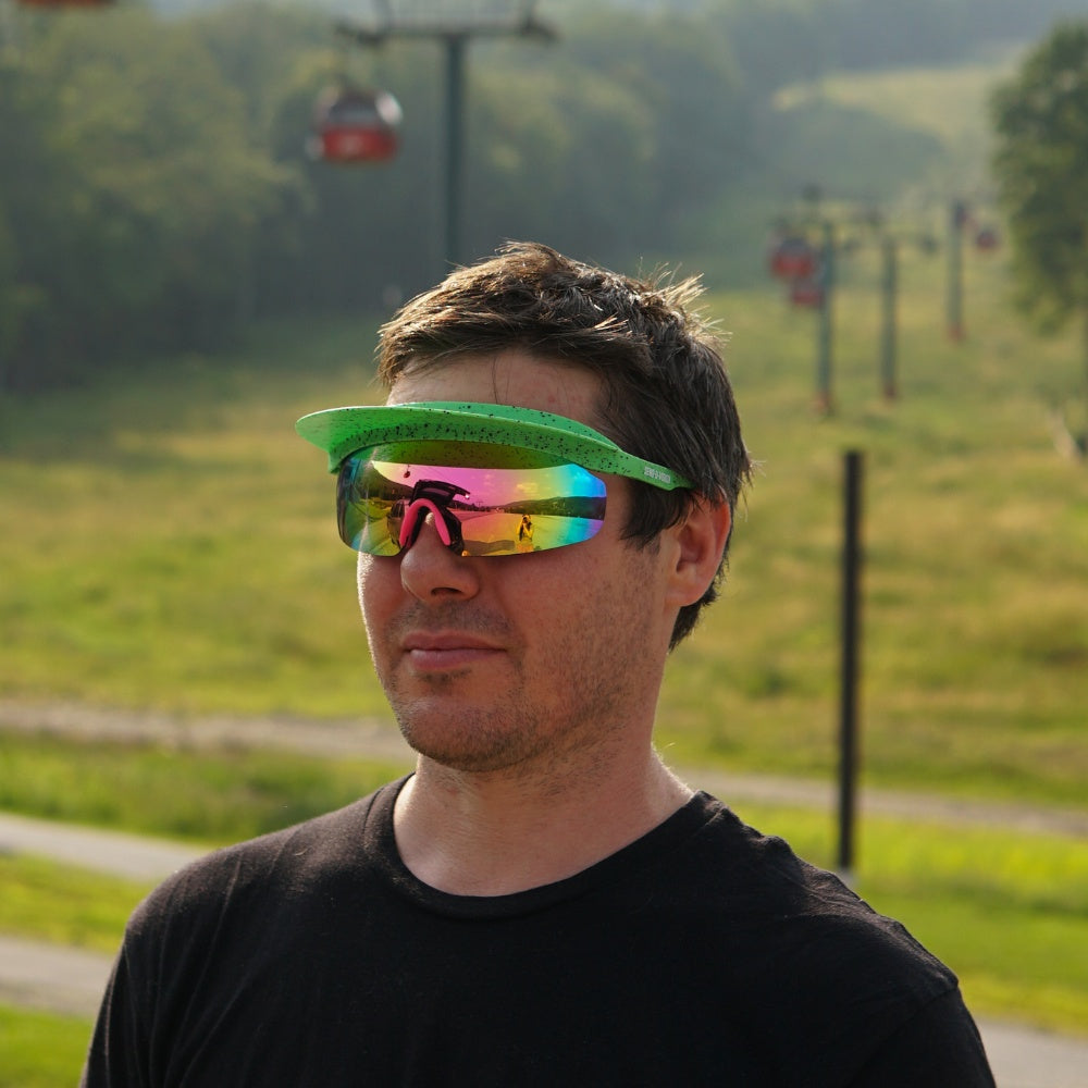 Jerry of the Day Send-O-Vision 8.0 the Sunsetter in green splatter man at gondola.  Funny ski and snowboard gifts, shirts and apparel.