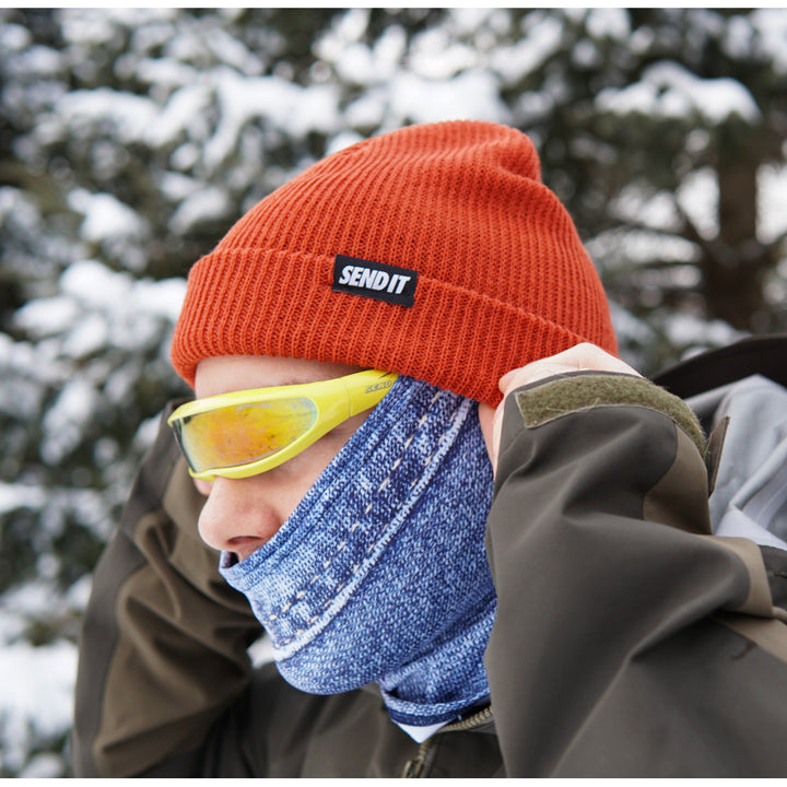 Jerry of the Day Send It Beanie in orange, man wearing folded in winter. Funny ski and snowboard gifts, shirts, and apparel.