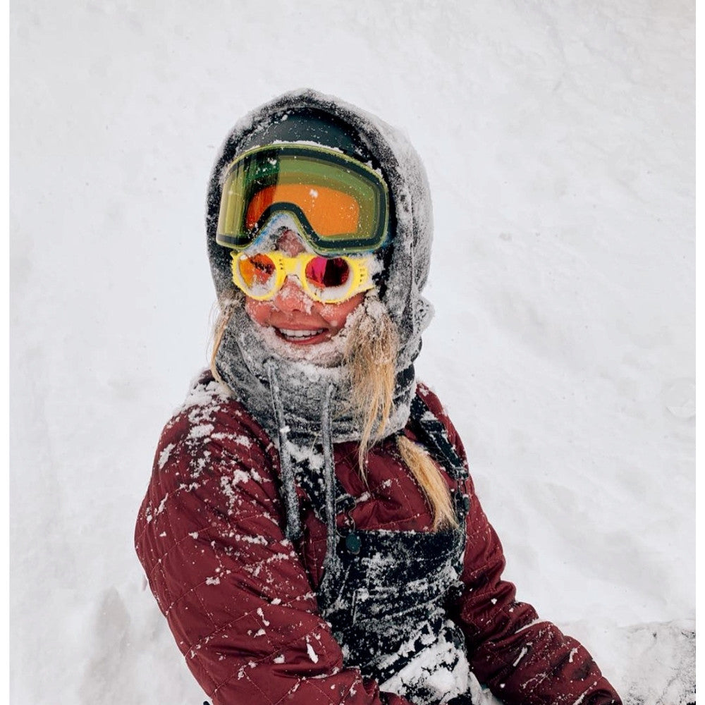 Jerry of the Day Send-O-Vision 2.0 Speed Goggles in yellow, woman playing in snow. Funny ski and snowboard gifts, shirts, and apparel.